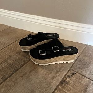 Sketchers platform slides with buckles